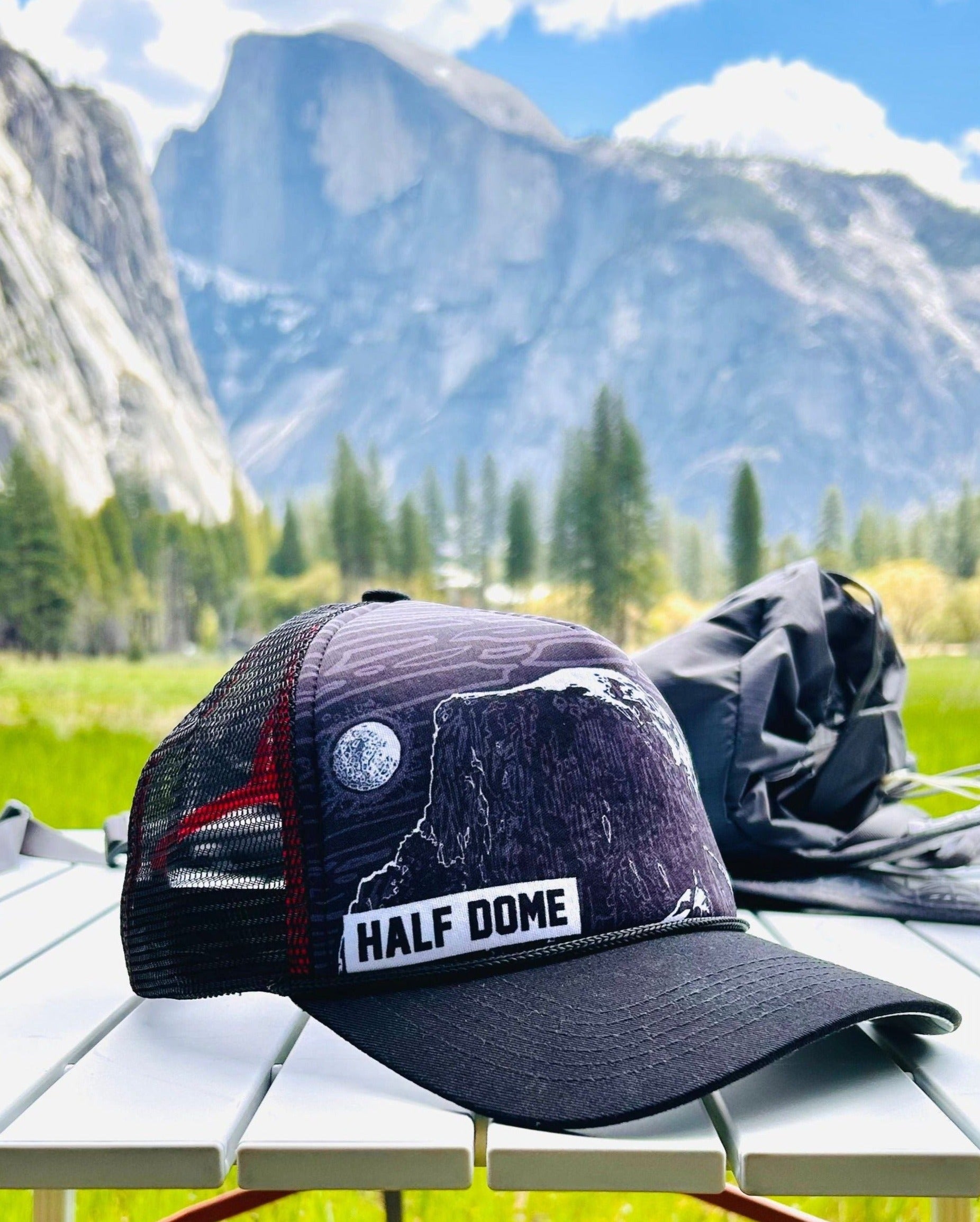 Partial side view of Half Dome trucker hat with Half Dome mountain in the background | HikerSight brand