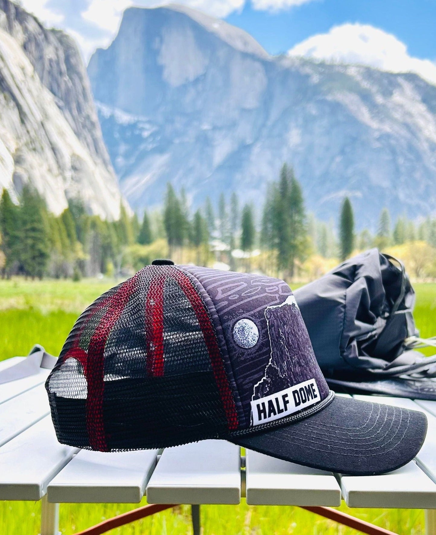 Side view of Half Dome trucker hat with Half Dome mountain in the background | HikerSight brand